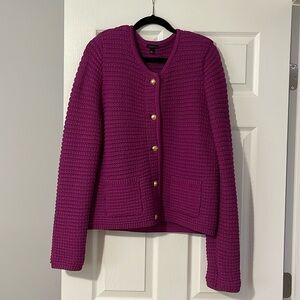 Talbot’s large pink cardigan. Gold buttons